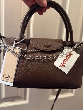 Brown Vegan Leather crossbody bag with silver bag chain.